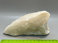 a white, partially transparent rock with no internal structure